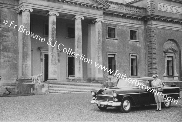 EMO COURT   FRONT OF HOUSE  LADY WITH CAR